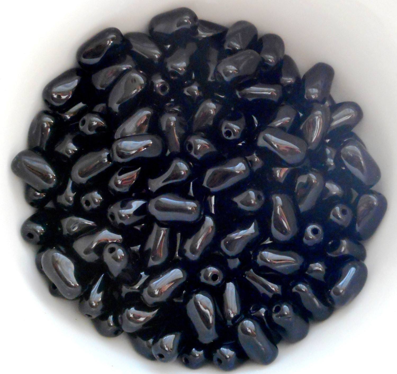 Lot of 25 9mm x 6mm Opaque Jet Black Czech glass twisted oval beads, C5425 - Glorious Glass Beads