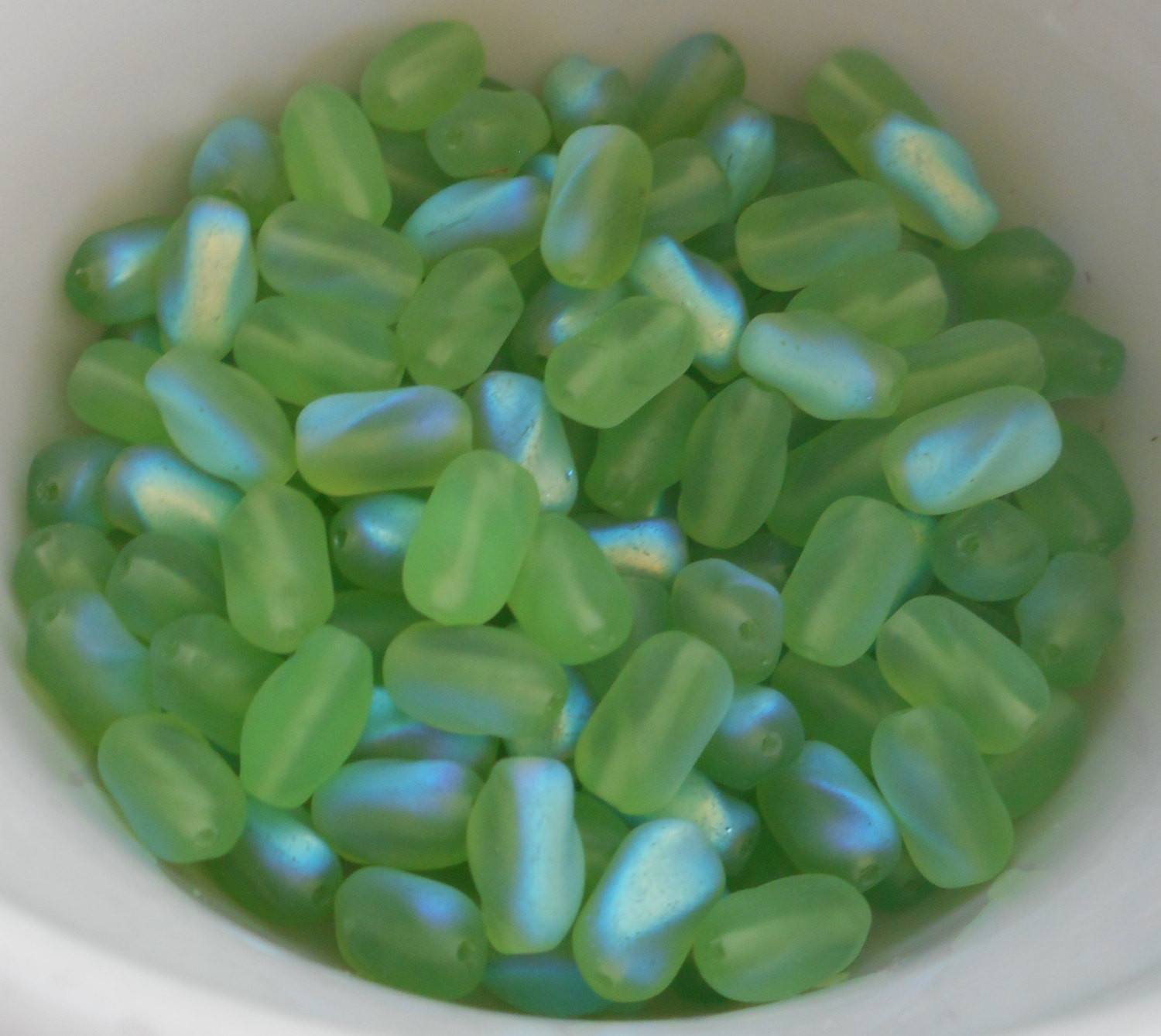 Lot of 25 9mm x 6mm Frosted Peridot Lime Green AB glass twisted oval beads, C2325 - Glorious Glass Beads