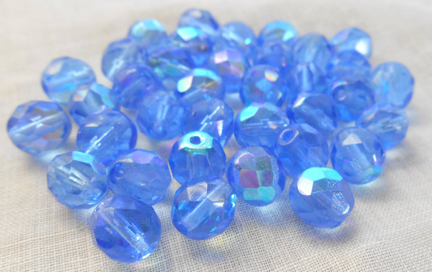 Lot of 25 8mm Czech glass Light Blue Sapphire AB, firepolished faceted round beads, C1625 - Glorious Glass Beads