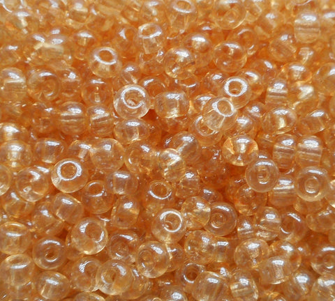 One pkg 24 grams Lumi Champagne, light amber Czech 6/0 glass seed beads, size 6 Preciosa Rocaille 4mm spacer beads, large, big hole C4624 - Glorious Glass Beads