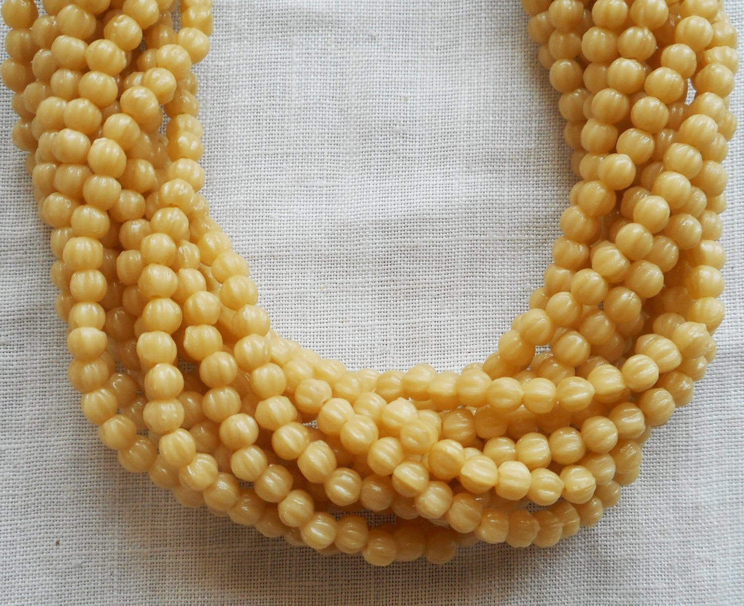 Lot of 100 3mm Antique Beige melon beads, neutral Czech pressed glass beads C93150 - Glorious Glass Beads