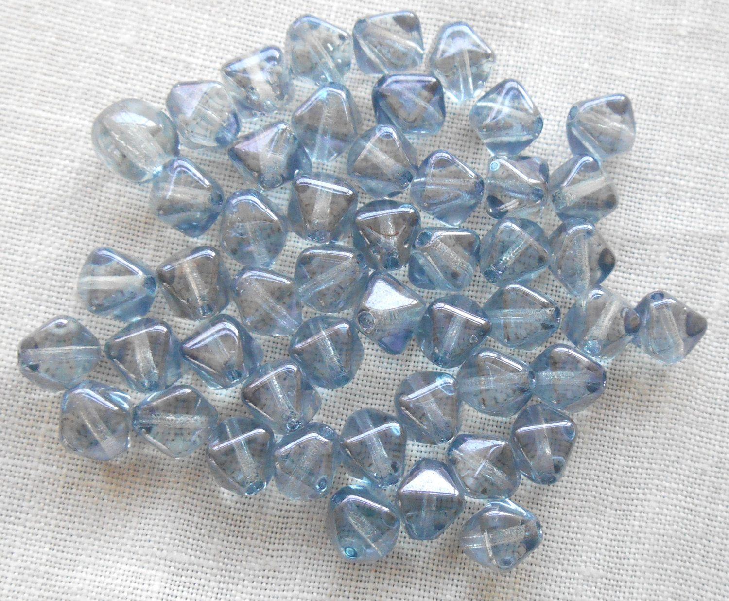 Fifty 6mm iridescent Lumi Blue bicones pressed glass Czech bicone beads, C7850 - Glorious Glass Beads