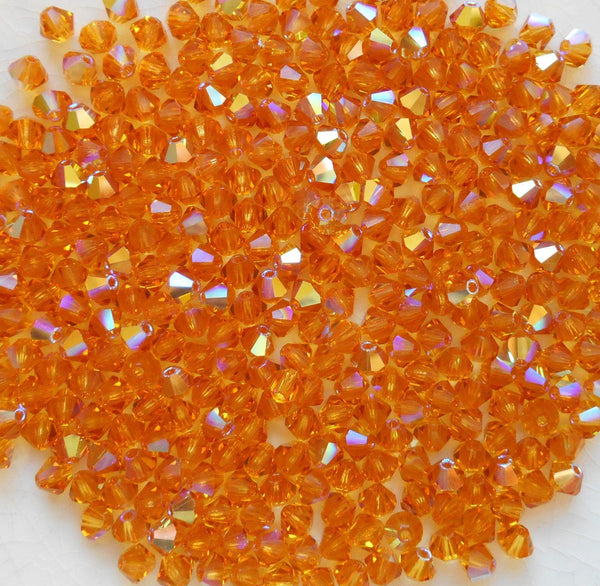 Lot of 20 4mm Czech Preciosa Crystal Topaz AB glass faceted bicone beads, C4520 - Glorious Glass Beads