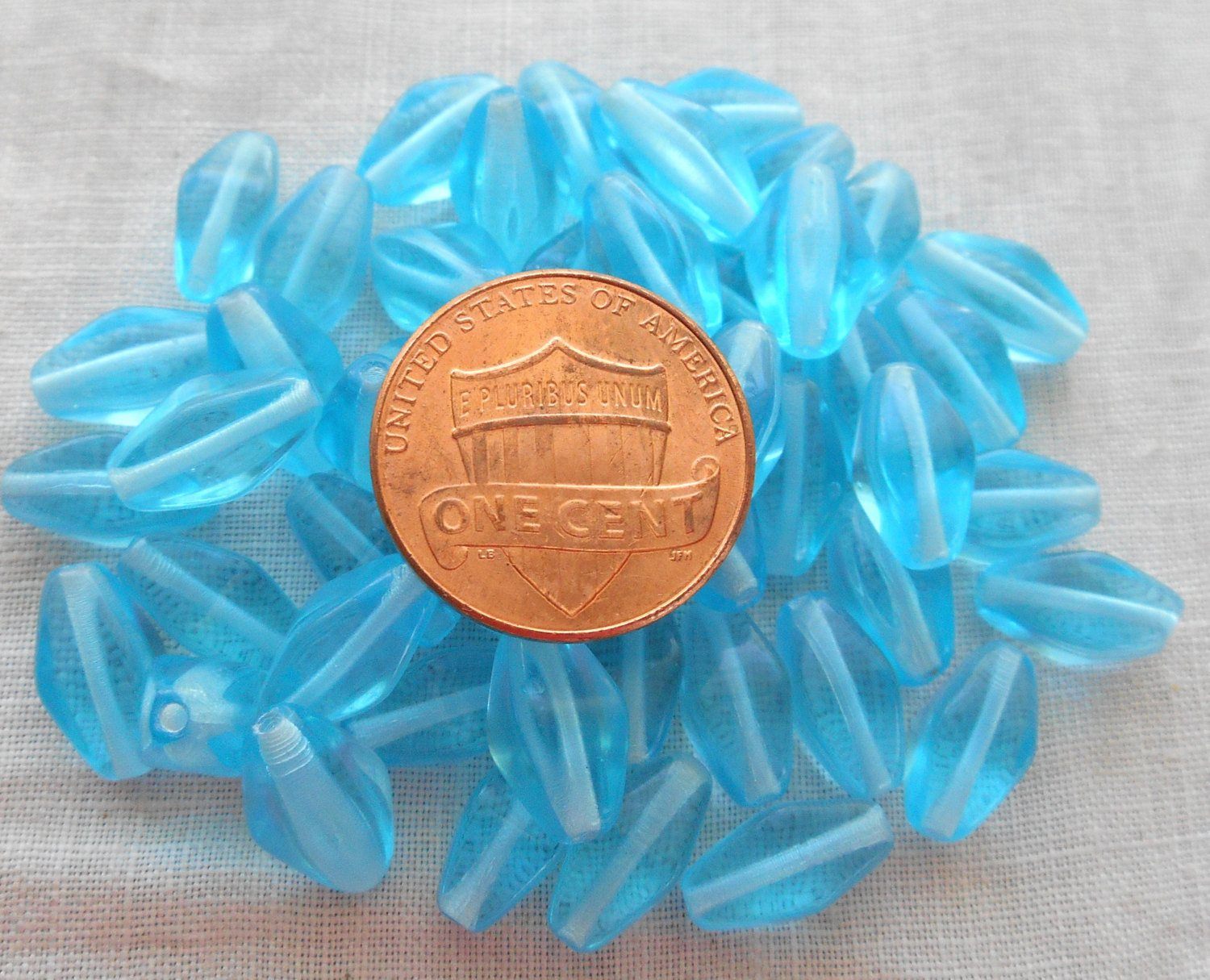 Lot of 25 11mm x 7mm Aqua Blue Czech glass lantern or tube beads, C9125 - Glorious Glass Beads