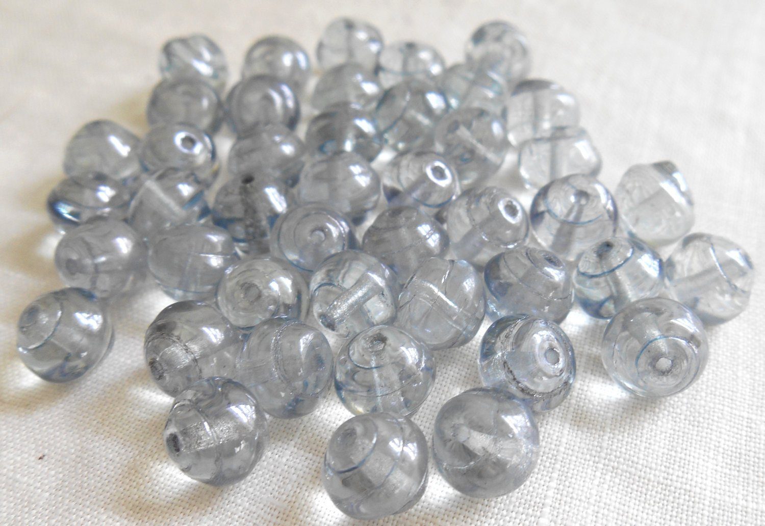 Lot of 25 8mm Czech Baroque Lumi Blue iridescent glass snail beads, C5425 - Glorious Glass Beads