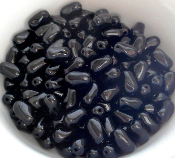 Lot of 25 9mm x 6mm Opaque Jet Black Czech glass twisted oval beads, C5425 - Glorious Glass Beads