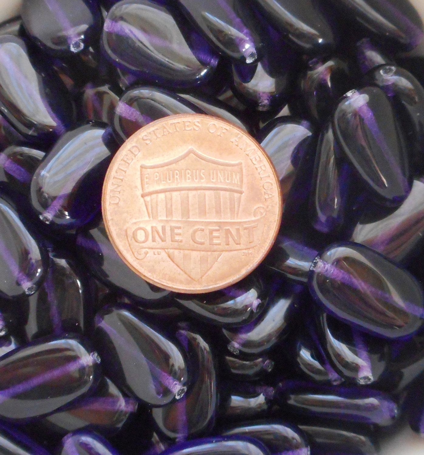 Lot of 25 Deep Violet, Purple, Amethyst slightly twisted oval Czech Glass beads, 14mm x 8mm pressed glass beads C6425 - Glorious Glass Beads