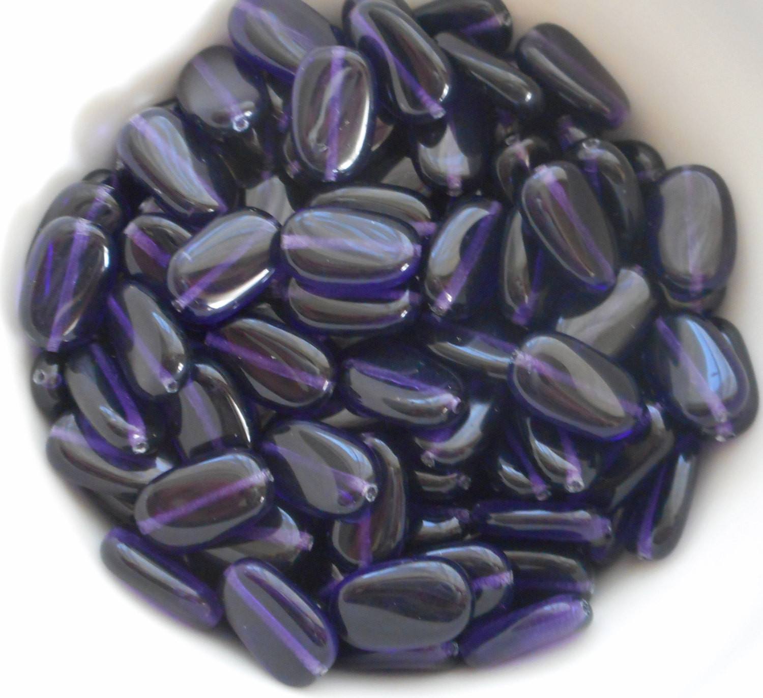 Lot of 25 Deep Violet, Purple, Amethyst slightly twisted oval Czech Glass beads, 14mm x 8mm pressed glass beads C6425 - Glorious Glass Beads