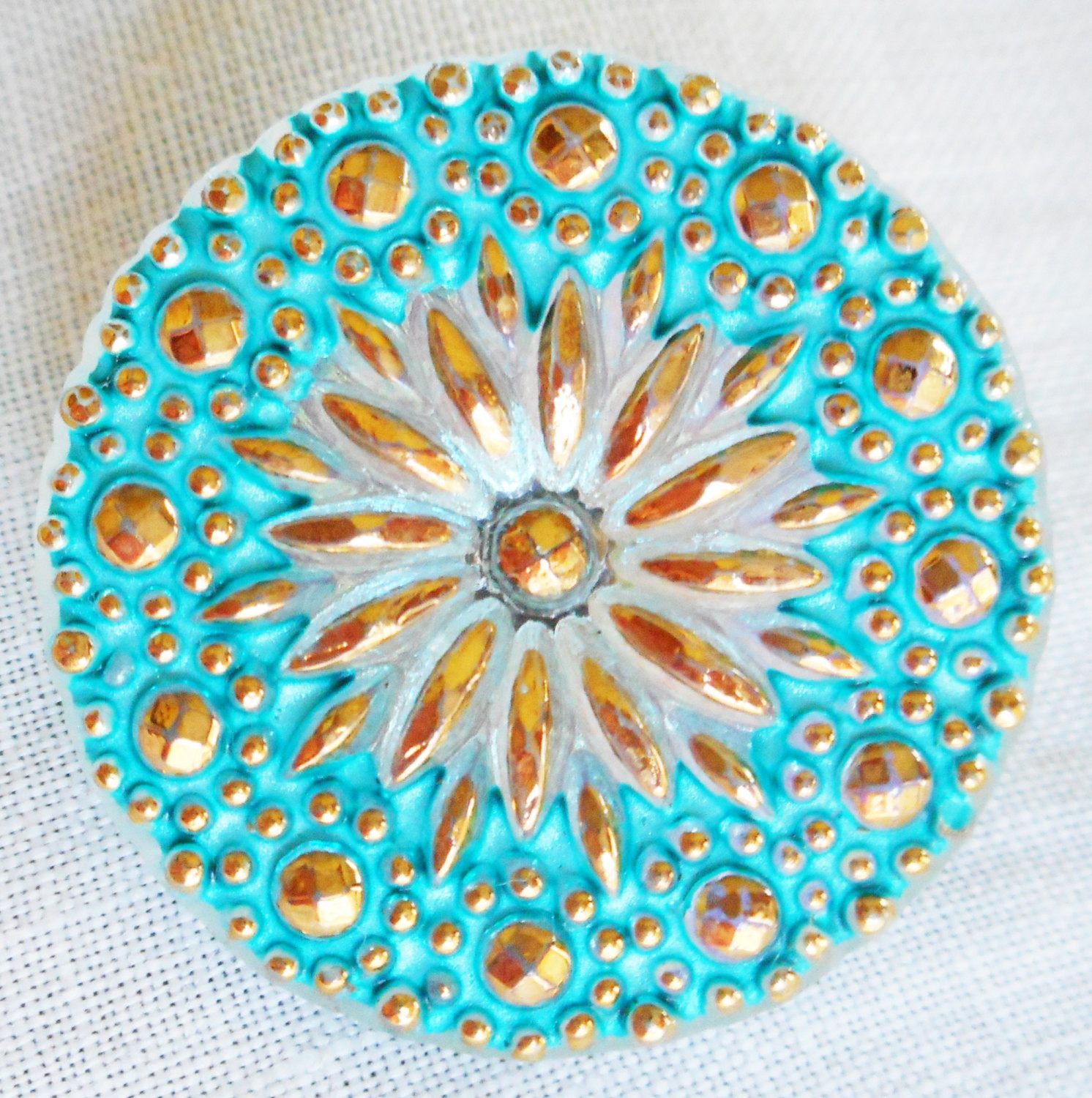 One 22mm Czech glass button, milky white & gold starburst with a turquoise blue wash, verdigris look decorative shank button 52301 - Glorious Glass Beads