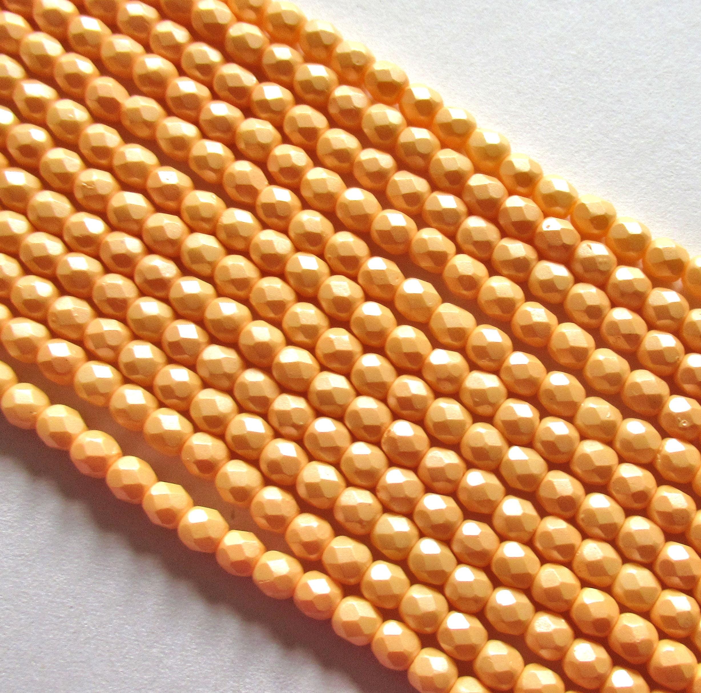 50 4mm Czech glass beads - powdery pastel orange -faceted round beads - C0018