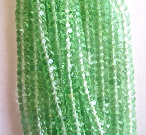 Fifty 6 x 3mm Czech glass faceted rondelle beads - transparent mint or peridot green spacers or rondelles C0037