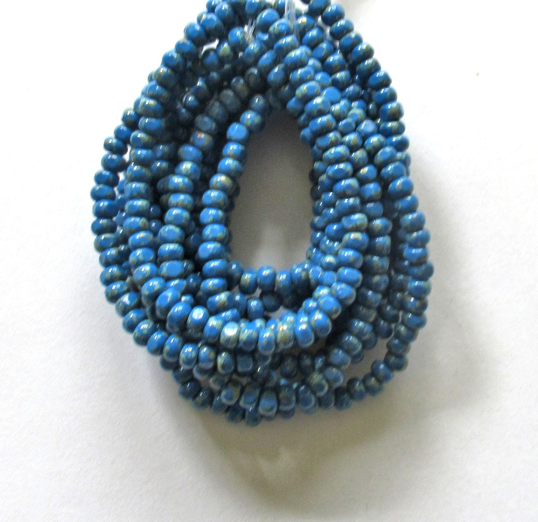 Fifty 6/0 tri cut faceted Czech glass seed beads - opaque light bright lapis blue picasso seed beads C0019