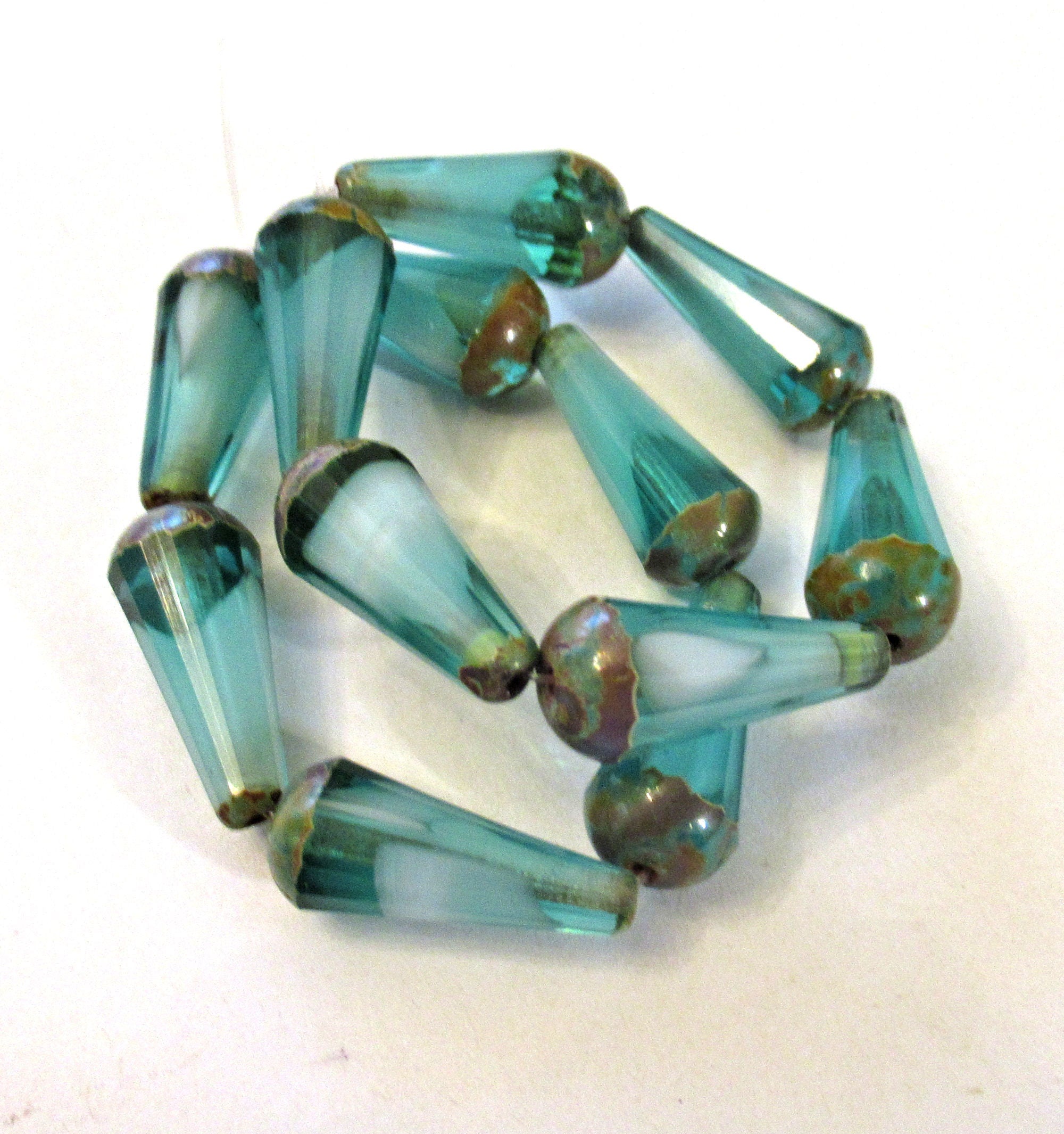 Six Czech glass long faceted teardrop beads - transparent aqua blue w/ white hearts & picasso finish on the ends - 9 x 20mm tear drop 00362