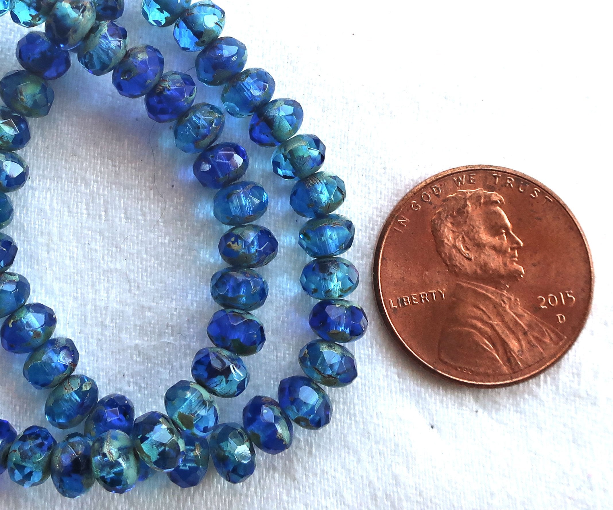 30 small puffy rondelle beads, transparent sapphire & aqua blue picasso mix, 3 x 5mm faceted Czech glass rondelles C53101