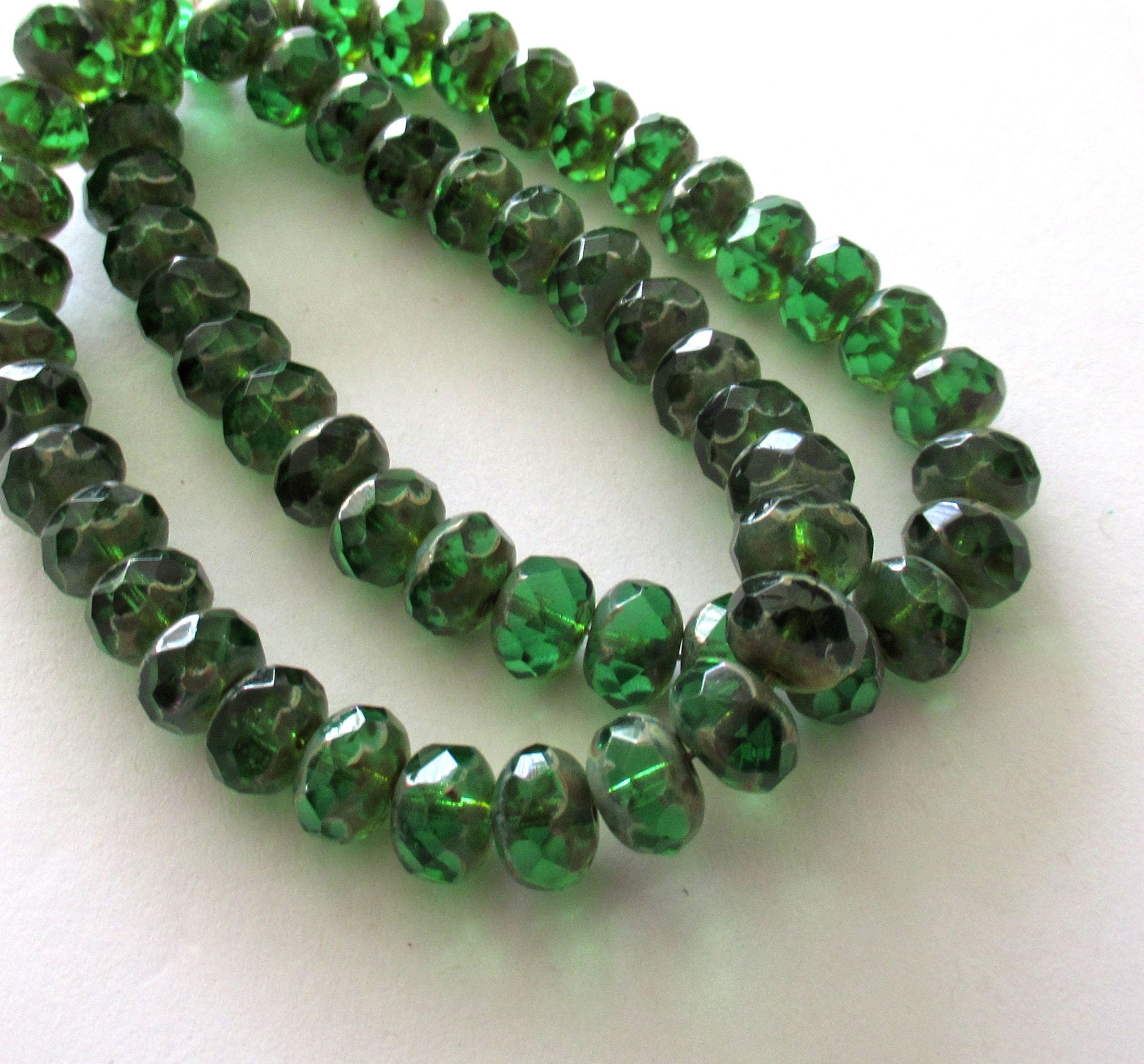 Lot of 30 6 x 9mm Czech glass puffy rondelle beads - transparent emerald green picasso faceted, fire polished puffy rondelles 00091