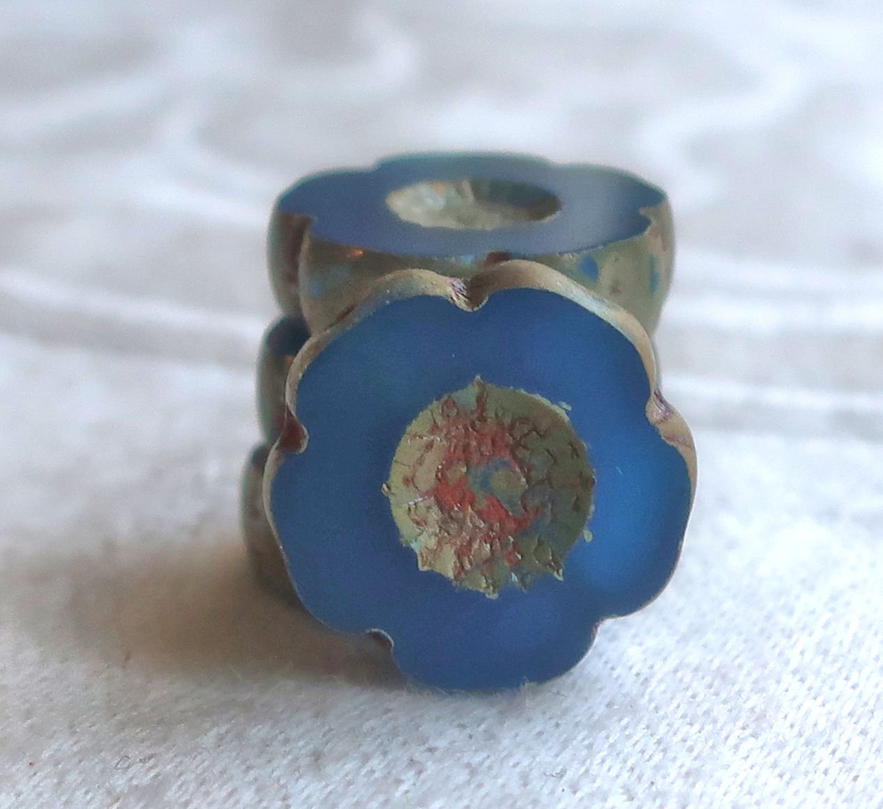 Six 14mm Czech glass flower beads. table cut, carved, translucent capri blue with a picasso finish, Hawaiian flowers C02101