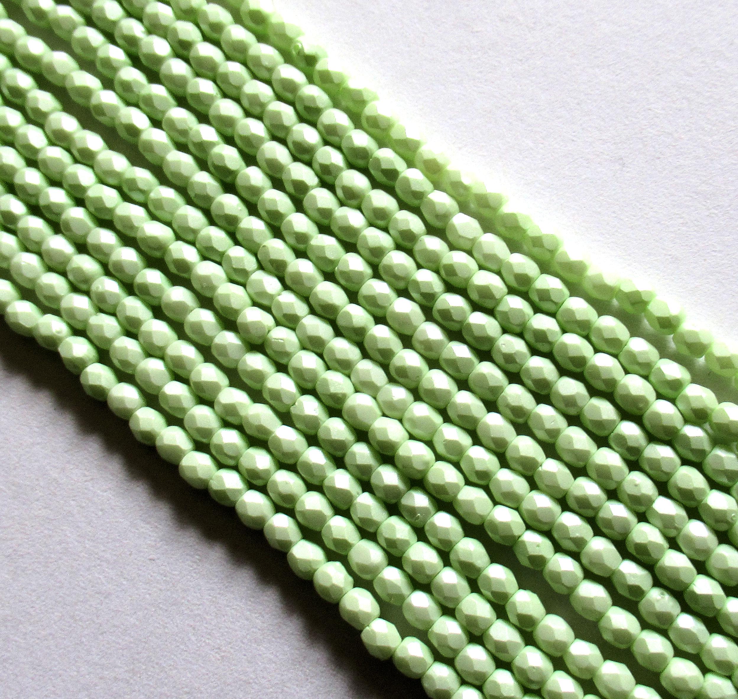 50 3mm Czech glass beads - light powdery pastel lime green - fire polished faceted round beads - C0085