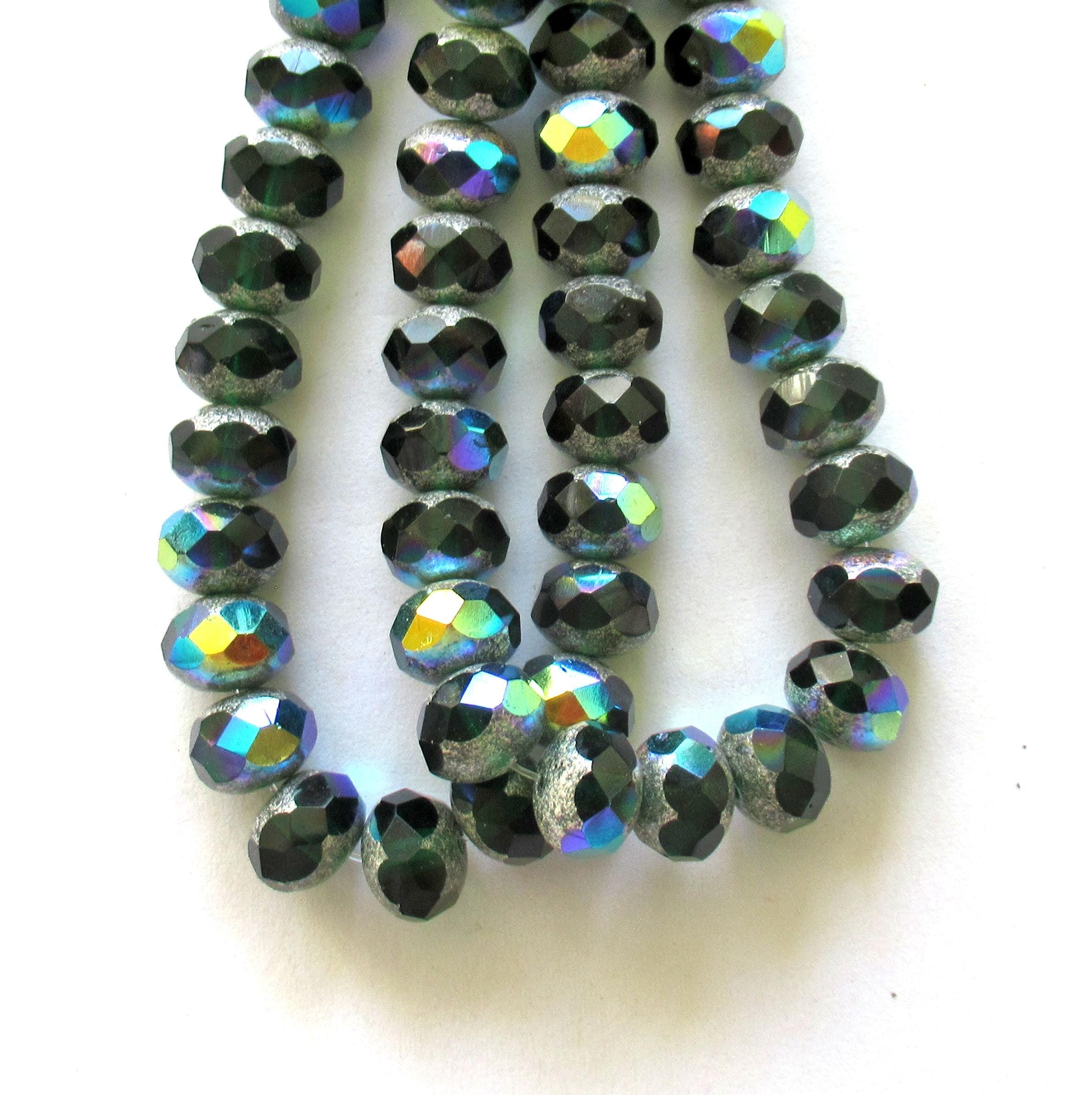 25 Czech glass puffy rondelle beads - 8 x 6mm - transparent dark emerald or forest green w/ silver & ab accents - 00362