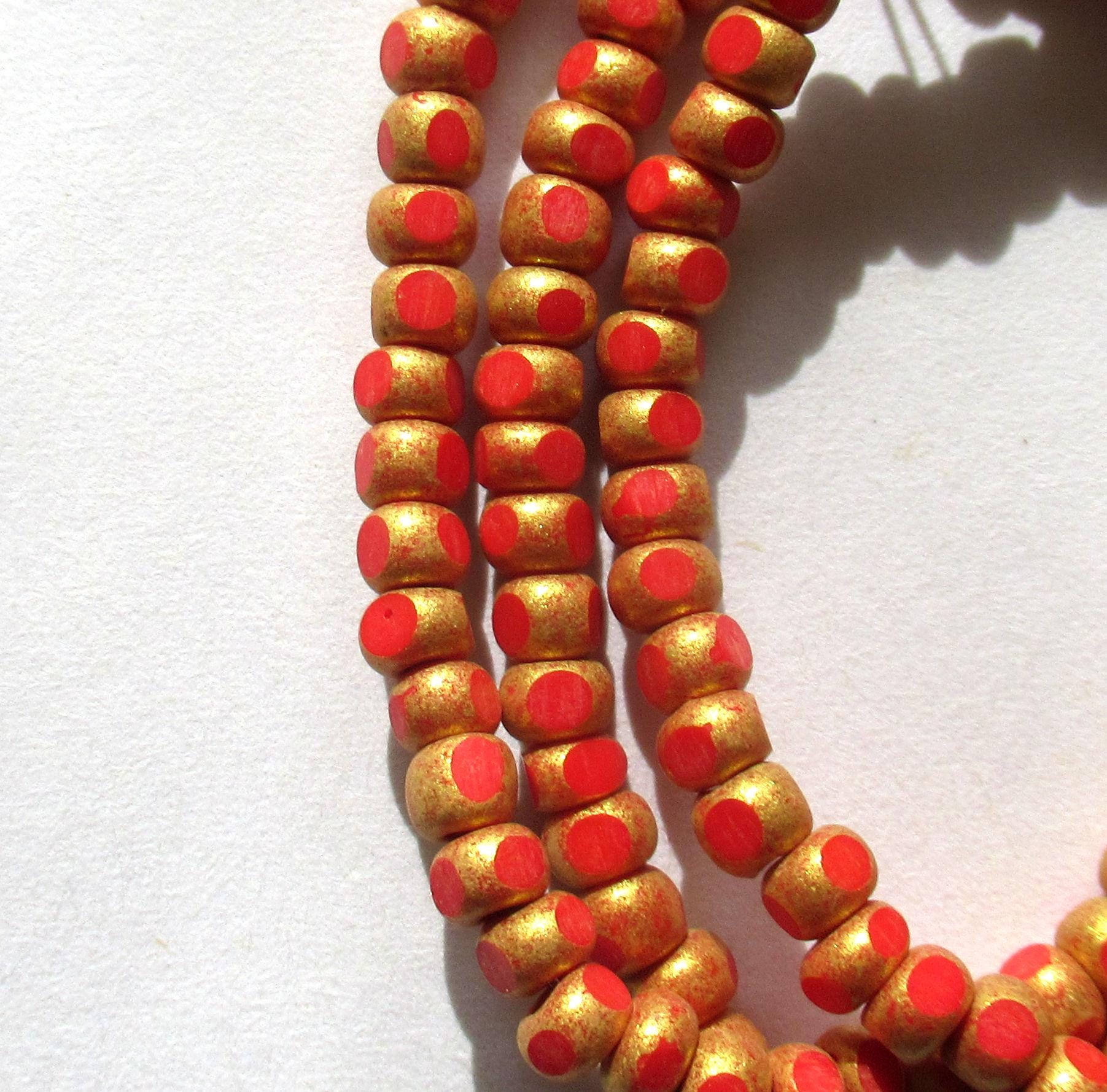 50 4 x 3mm Czech glass Tri-cut beads - opaque bright red w/ gold accents - 6/0 faceted seed beads - C00141