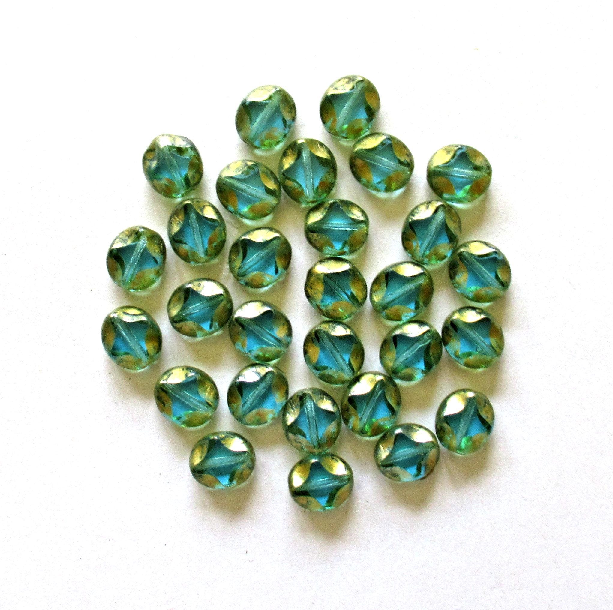 10 Czech glass oval beads - 9 x 8mm - light teal blue green w/ gold picasso accents - carved table cut beads with a diamond pattern - C0121