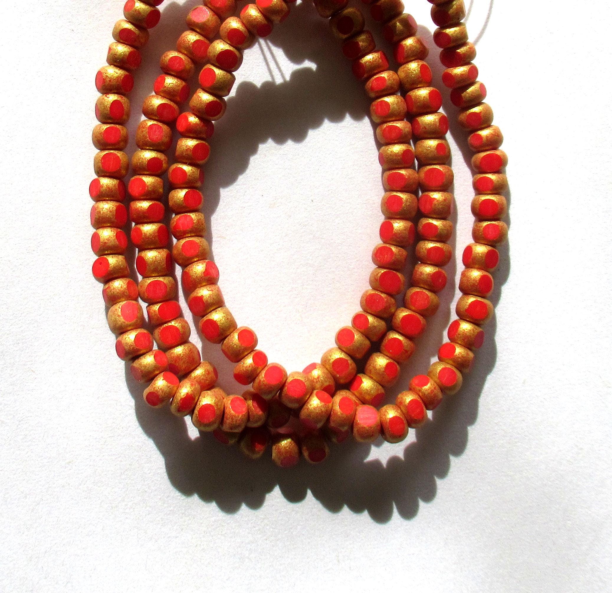 50 4 x 3mm Czech glass Tri-cut beads - opaque bright red w/ gold accents - 6/0 faceted seed beads - C00141