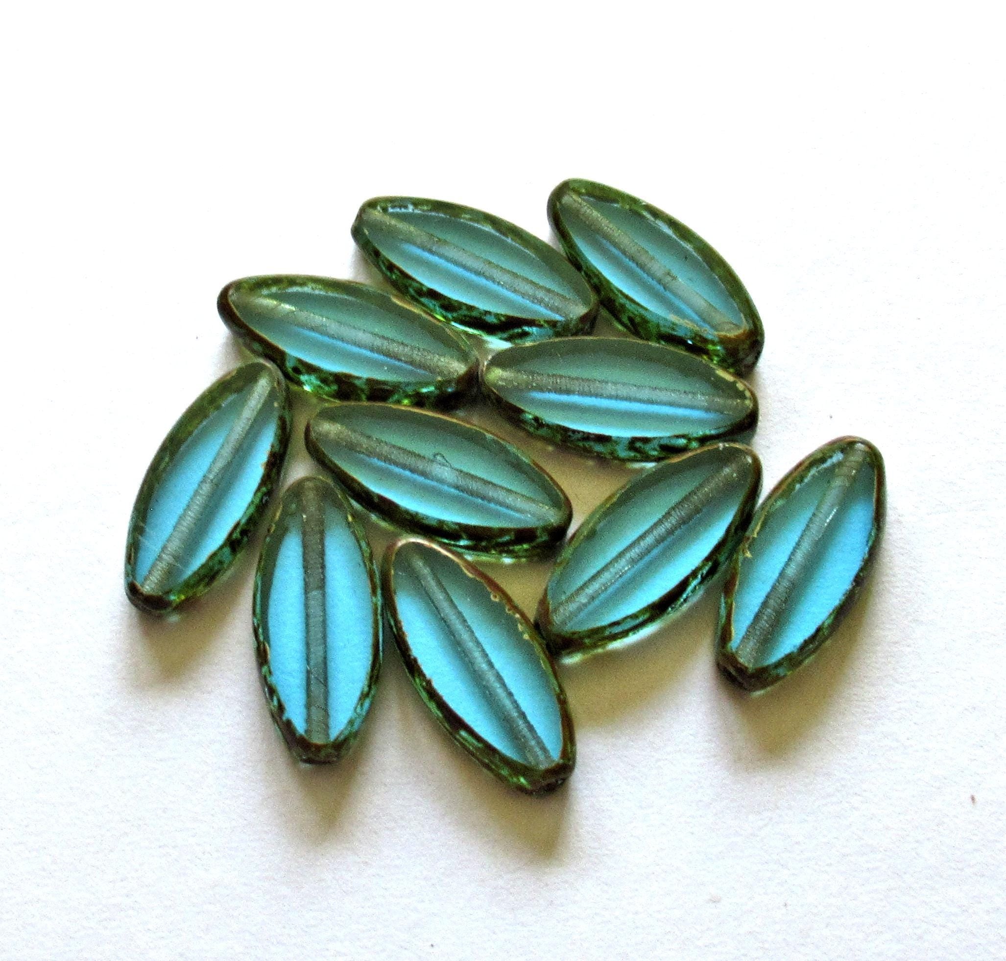 Ten Czech glass spindle beads - transparent aqua blue - 18 x 7mm - table cut beads - C00052