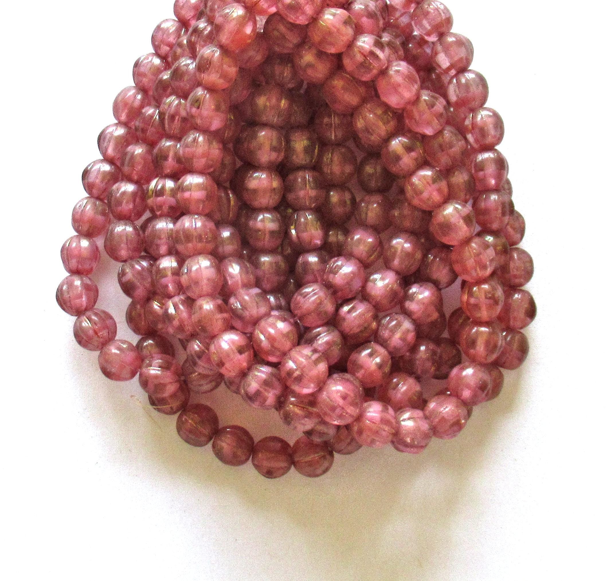 25 Czech glass melon beads - 6mm - translucent pink with a gold luster finish - C00351
