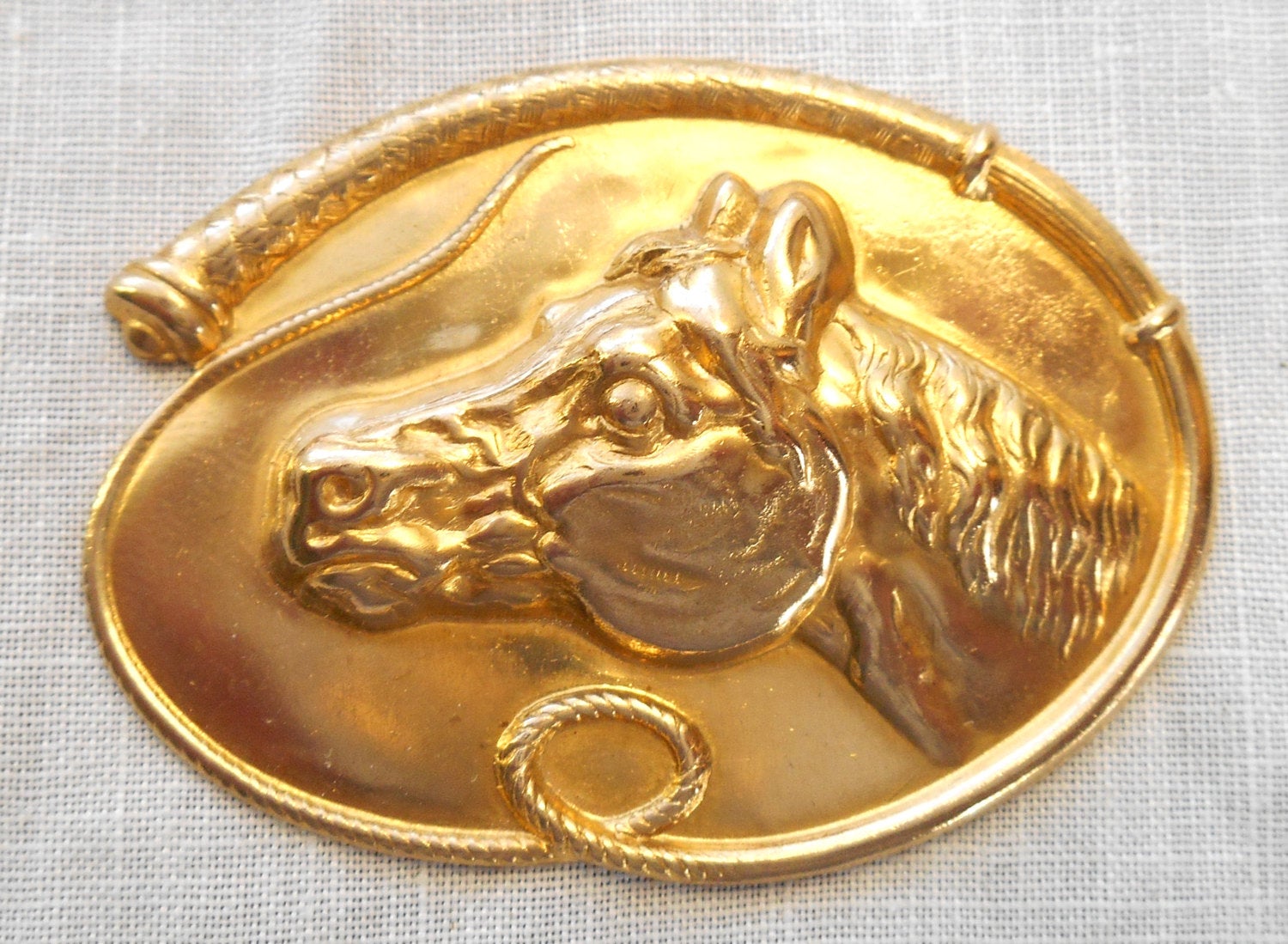 1 large raw brass stamping, a horse's head within a whip, a pendant, charm, connector, ornament, 52mm by 37mm USA made 6501 - Glorious Glass Beads
