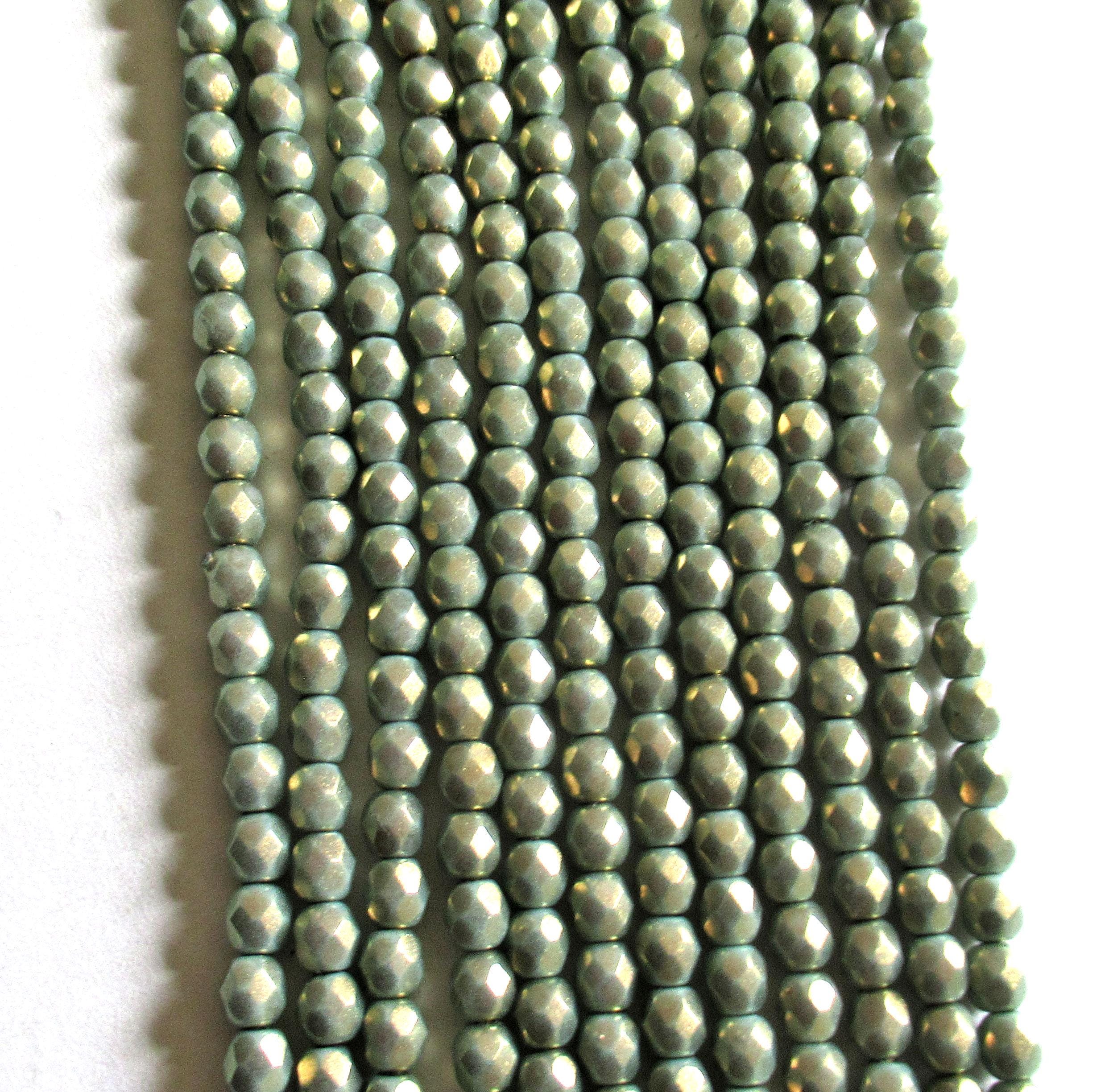 50 4mm Czech glass beads - Halo Ethereal Heavens - light green faceted round beads with a shiny gold finish - C00039