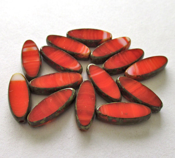 Twelve Czech glass spindle beads - 16 x 6mm - opaque marbled red & white picasso - table cut - almond shaped beads C00641