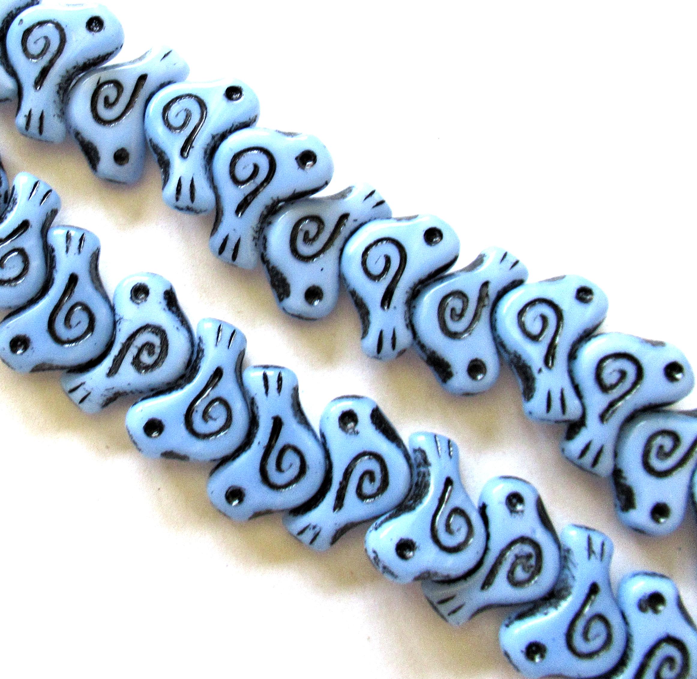 8 Czech glass bird beads - 12 x 16mm - opaque light blue with a black wash - C0621