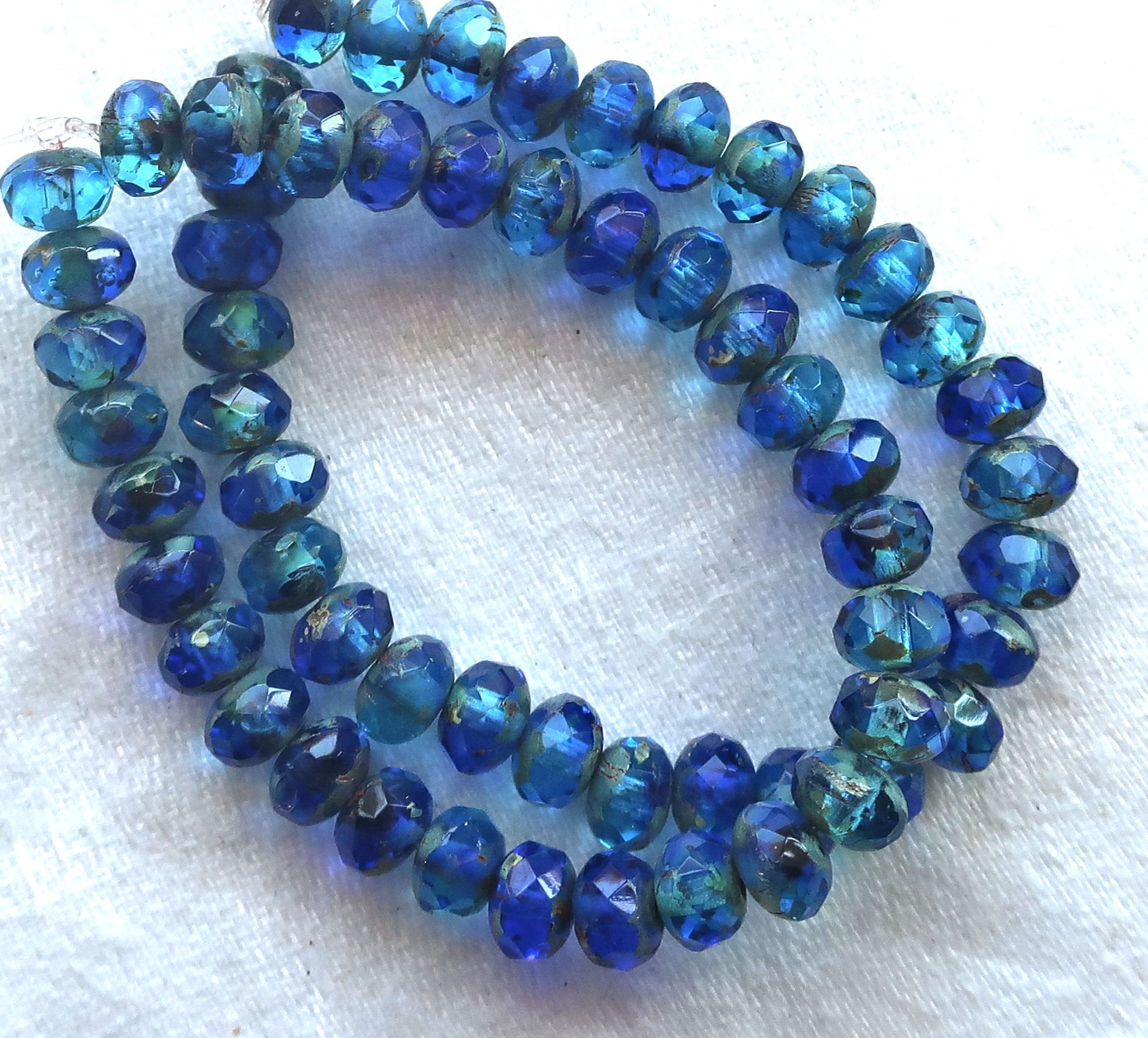 30 small puffy rondelle beads, transparent sapphire & aqua blue picasso mix, 3 x 5mm faceted Czech glass rondelles C53101