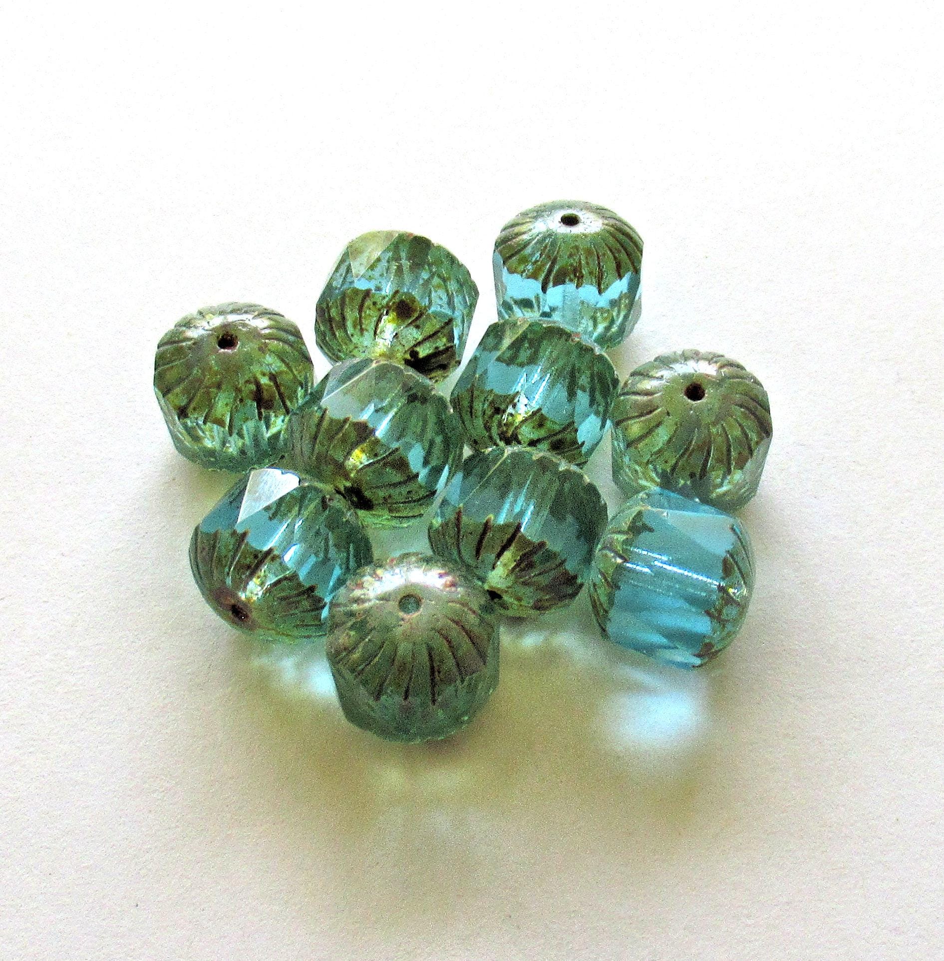 Ten Czech glass faceted carved cruller beads - 10mm - transparent aqua blue - cathedral beads w/ picasso accents on the ends - 00004