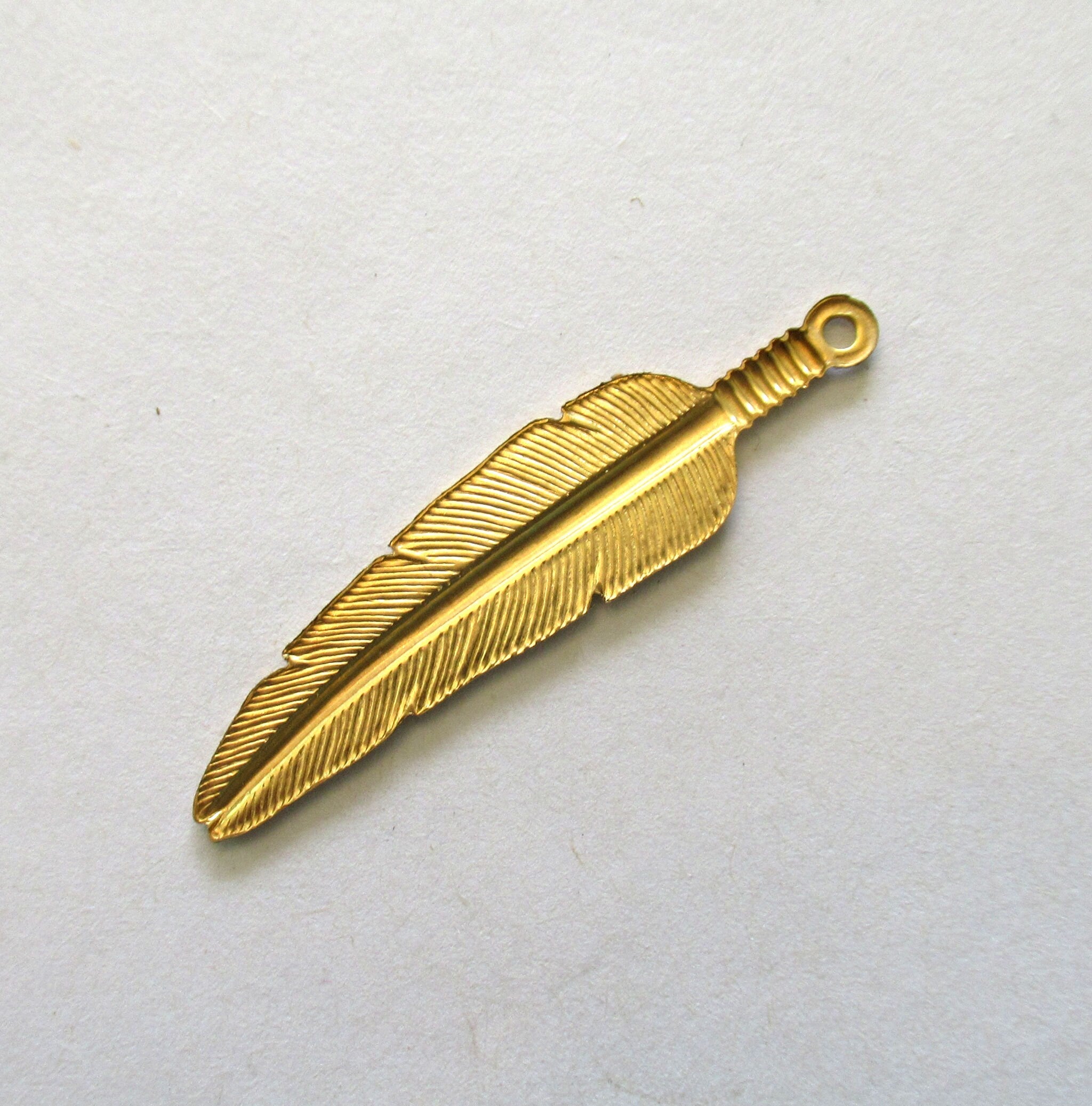 4 Raw Brass Stampings - feather dangles - charms - drops - earrings - 1.75 by .5" inches - made in the USA C00801