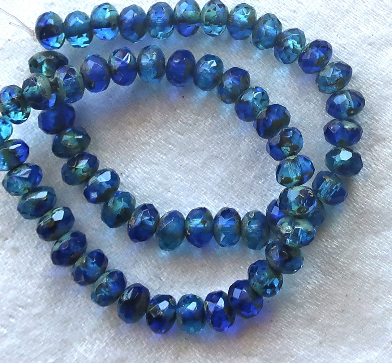 30 small puffy rondelle beads, transparent sapphire & aqua blue picasso mix, 3 x 5mm faceted Czech glass rondelles C53101