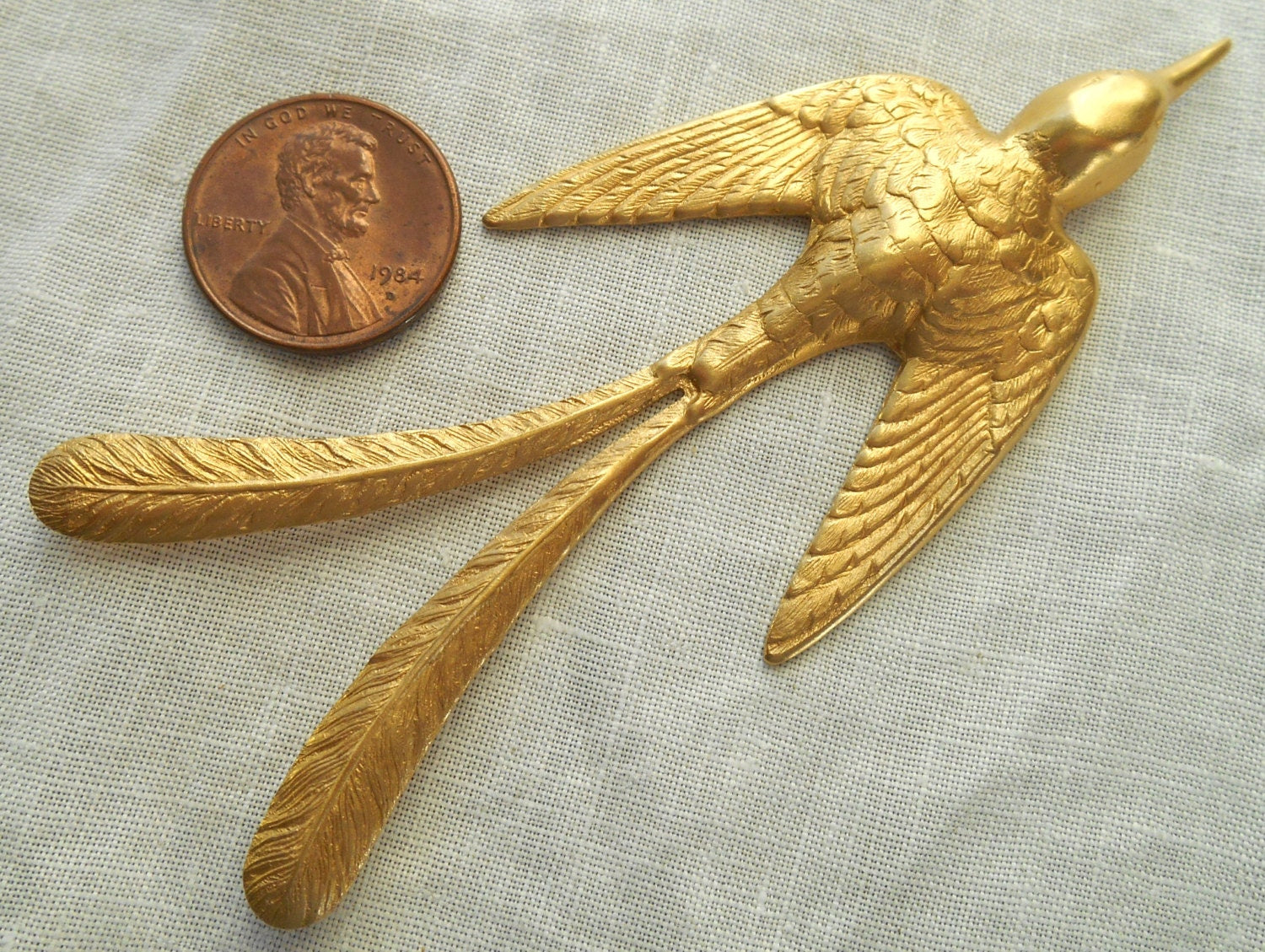 1 large raw brass stamping, art nouveau, elongated flying bird, pendant, charm, ornament, connector 3.5" x 1.37" USA msde C1901 - Glorious Glass Beads