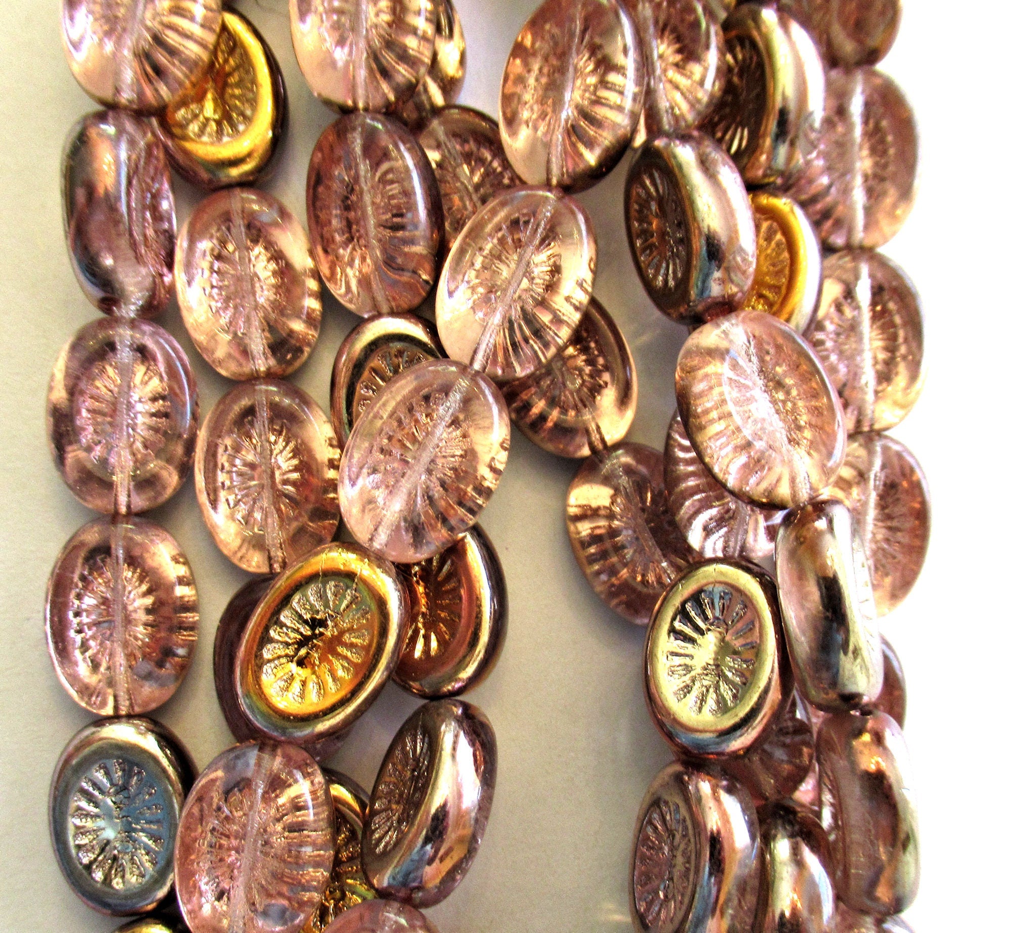 Ten 14 x 11mm Czech glass oval kiwi beads - transparent pink with a metallic finish on one side - pressed glass beads - C00011