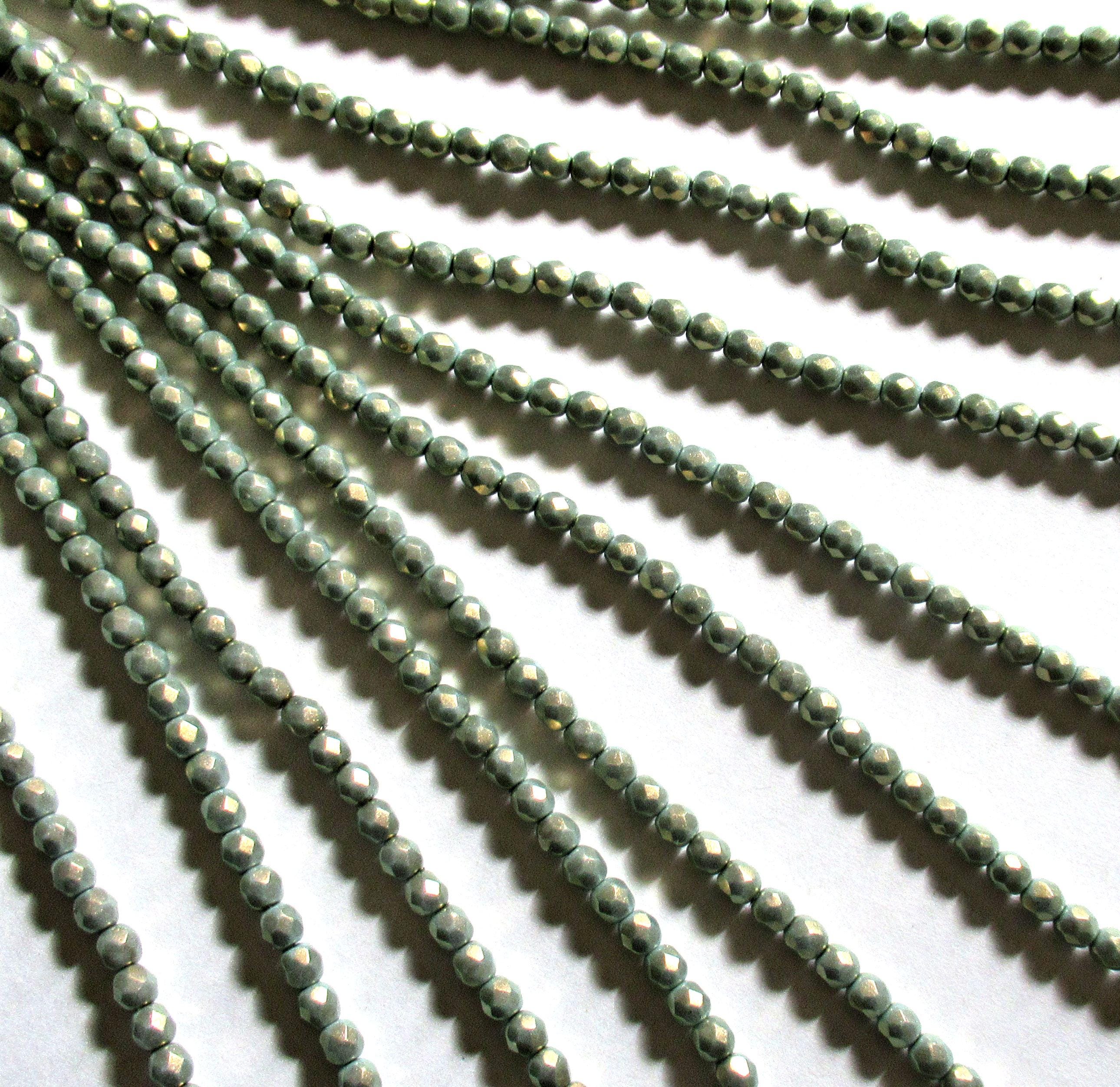 50 4mm Czech glass beads - Halo Ethereal Heavens - light green faceted round beads with a shiny gold finish - C00039