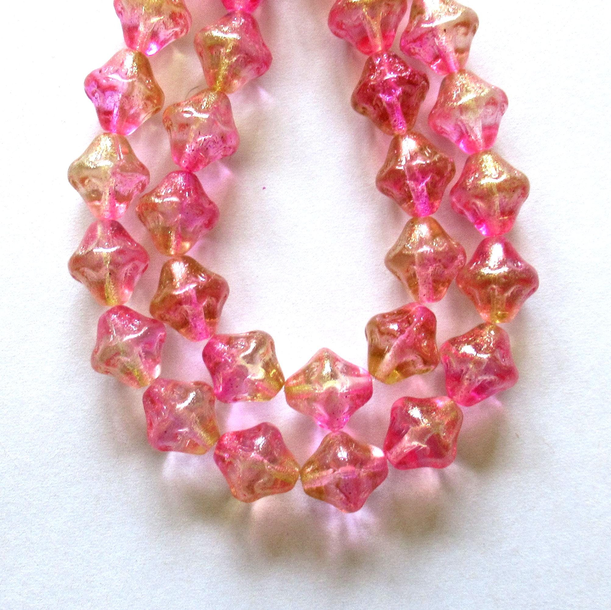 Six large Czech glass bicones - 11mm - bright pink & champagne w/ a gold luster finish bicone beads - C00201