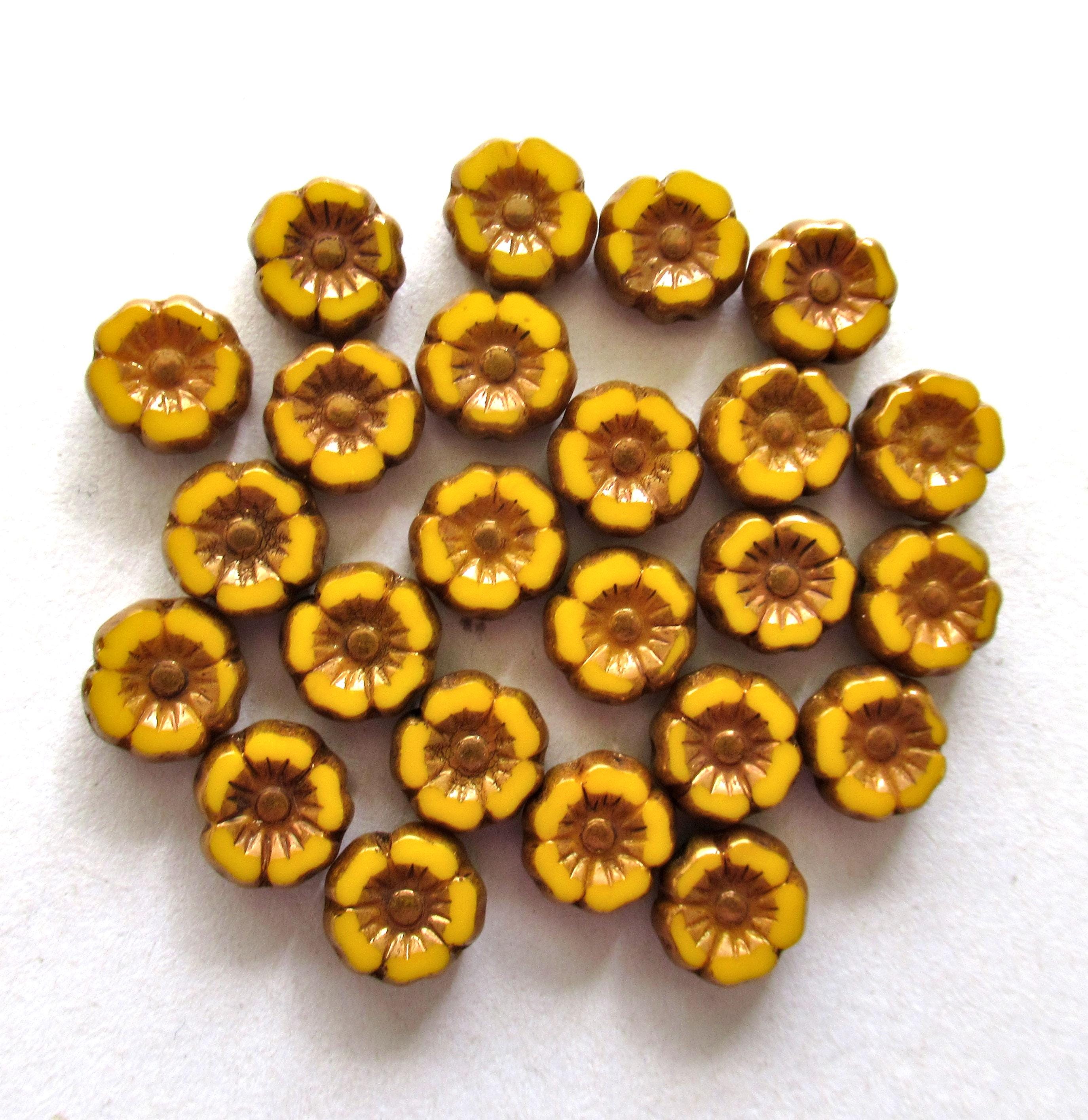 Lot of twelve 7mm Czech glass flower beads - orange yellow with bronze accents - table cut carved hibiscus Hawaiian floral beads - 00061