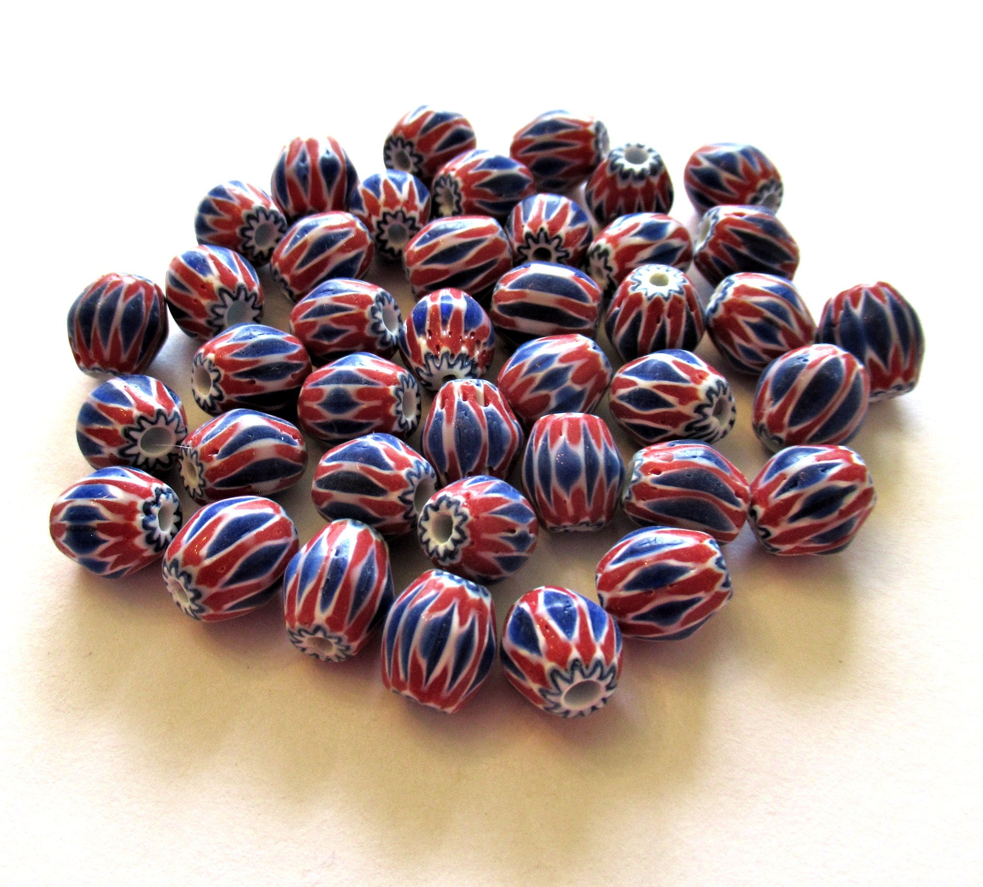 Lot of 15 blue, white and red striped glass chevron Beads - approx 9 x 8.5mm oval beads - rustic earthy beads made in India C0025