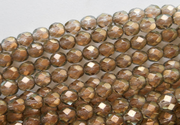 25 6mm Halo Linen Czech glass , Green glass over Gold firepolished, faceted round beads with a C2925