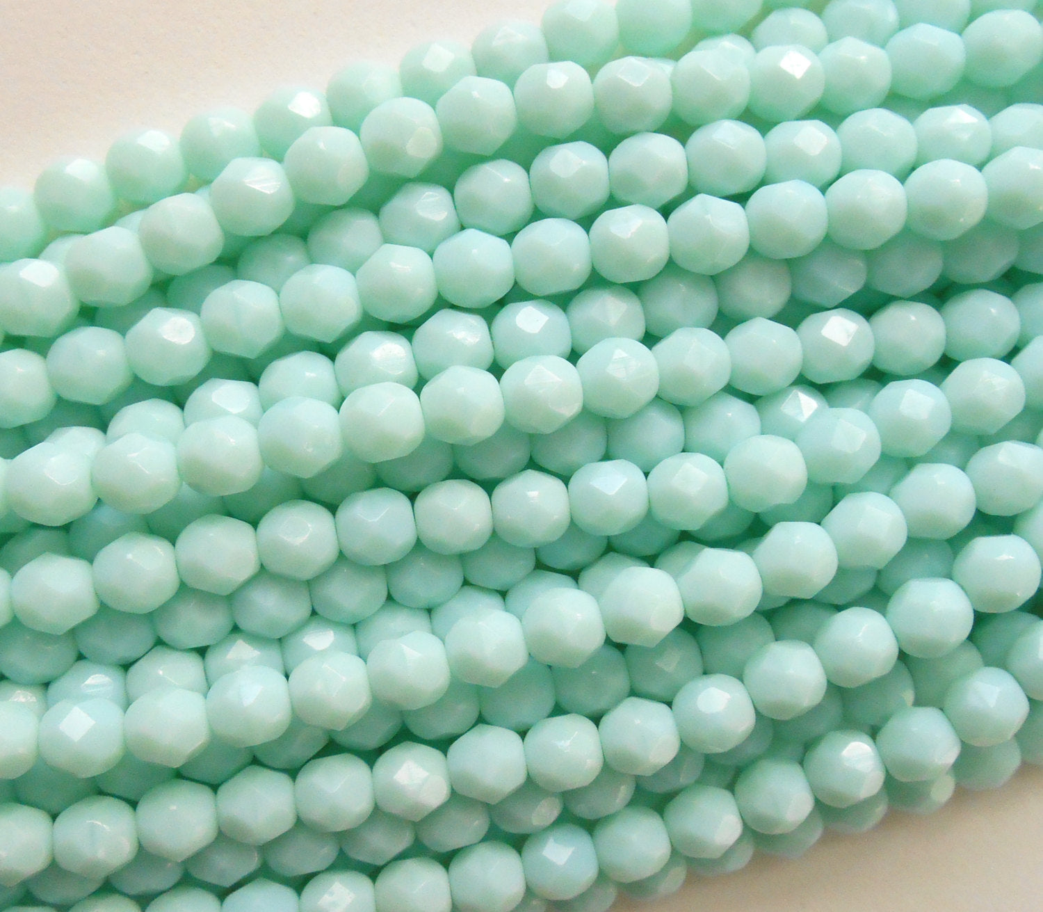 25 6mm Opaque Pale Jade Czech glass beads, minty geen, firepolished, faceted round beads, C7625 - Glorious Glass Beads