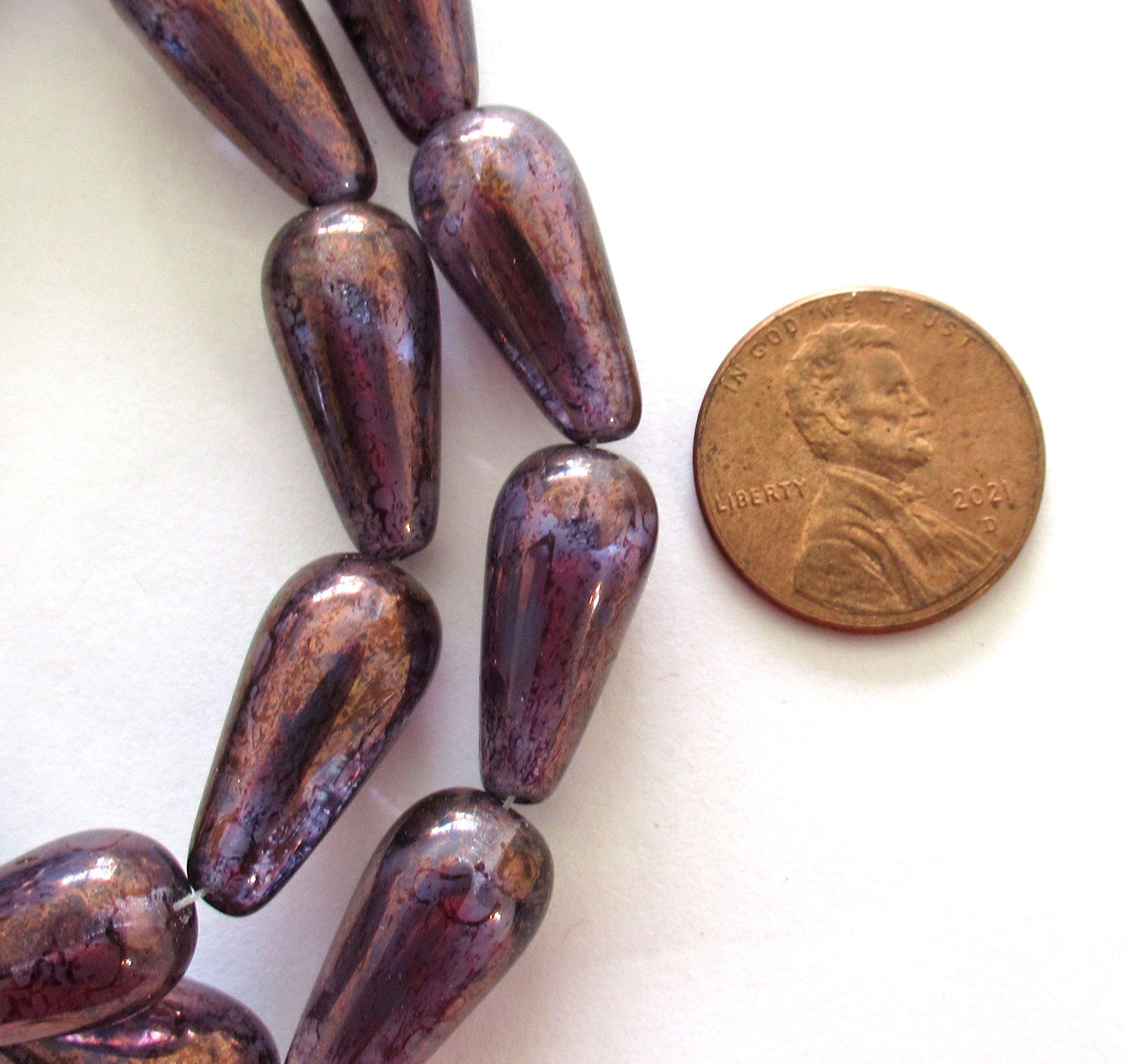 Six Czech glass teardrop beads - amethyst / purple with a bronze finish - 9 x 20mm elongated tear drops 00311