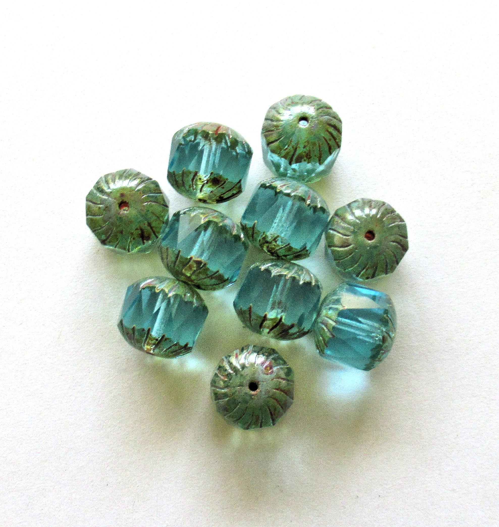 Ten Czech glass faceted carved cruller beads - 10mm - transparent aqua blue - cathedral beads w/ picasso accents on the ends - 00004