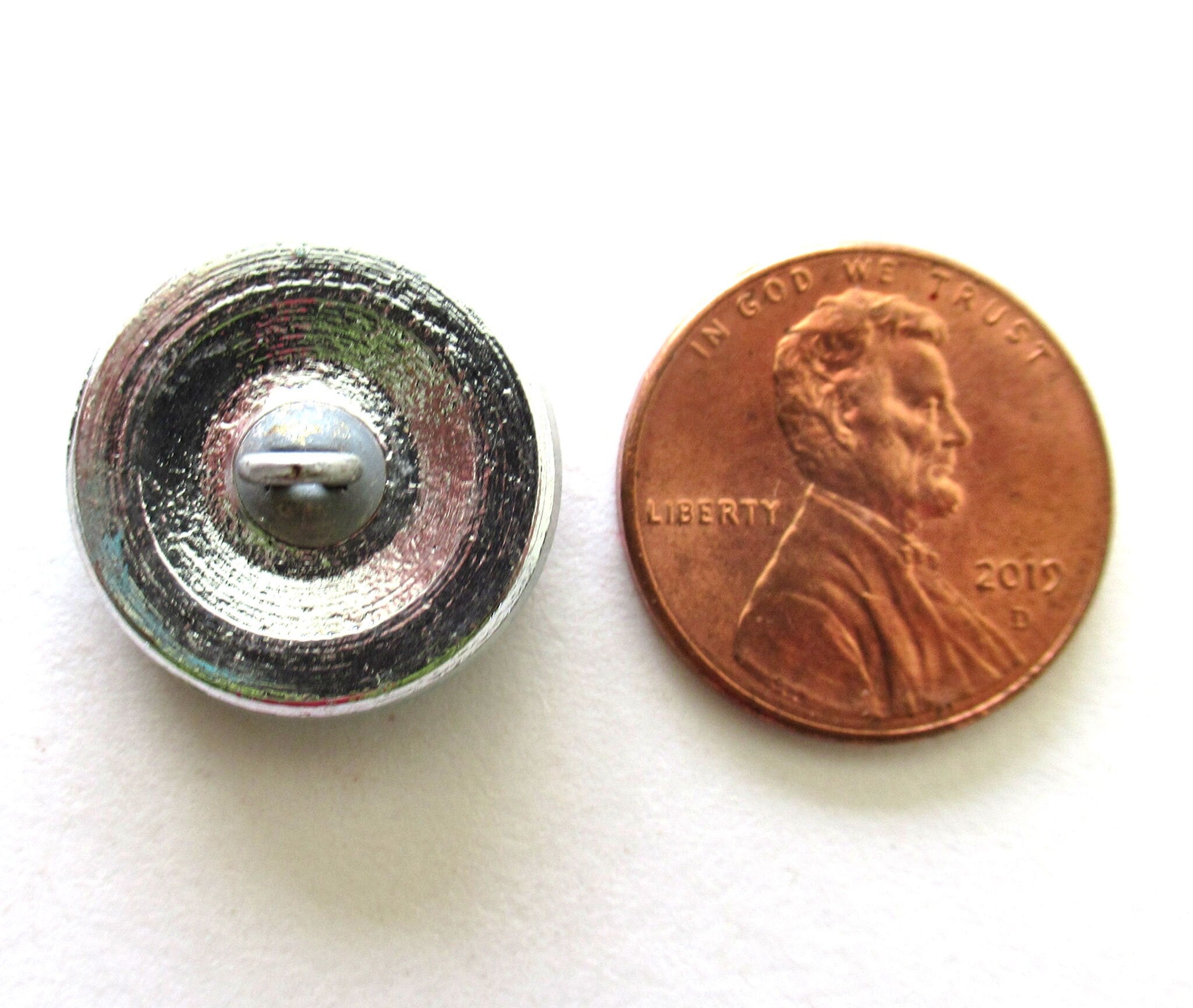 One 18mm Czech art glass button - multicolored gold raised star with a turquoise wash - verdigris look decorative shank button 00432
