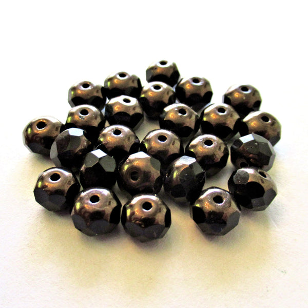 25 Czech glass puffy rondelle or donut beads - 5 x 7mm jet black beads w/ bronze finish on the ends - fire polished faceted rondelles 00612