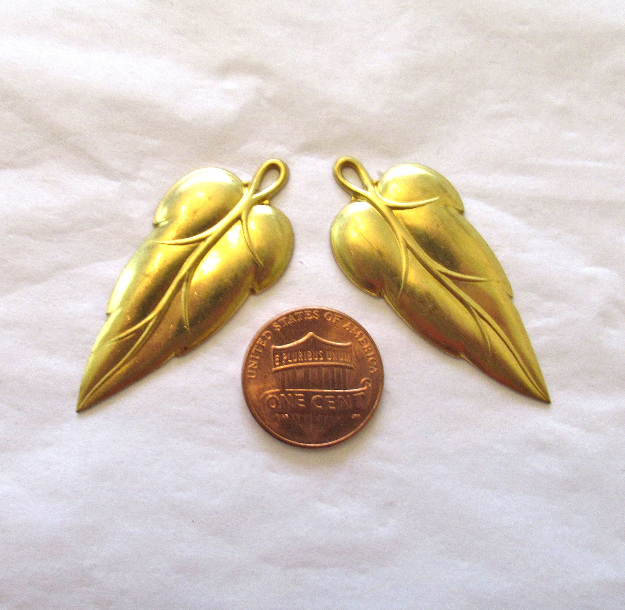 2 stylized raw brass leaf stampings - leaves - pendants - charms - earrings with ring 44mm in by 19mm - made in the USA 0079