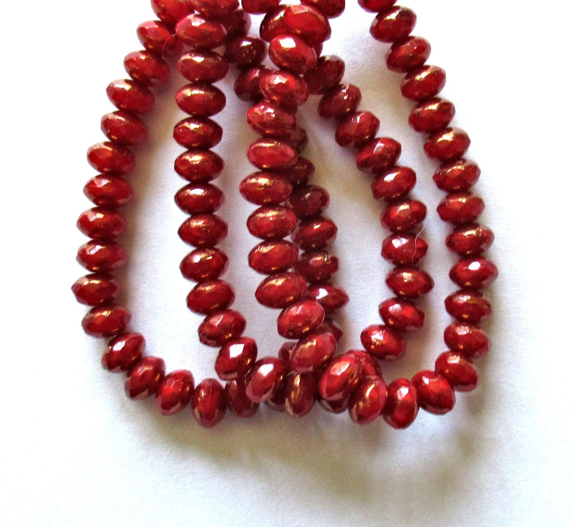 30 small Czech glass puffy rondelle beads - 3mm x 5mm - deep red with bronze accents - faceted fire polished - 00041
