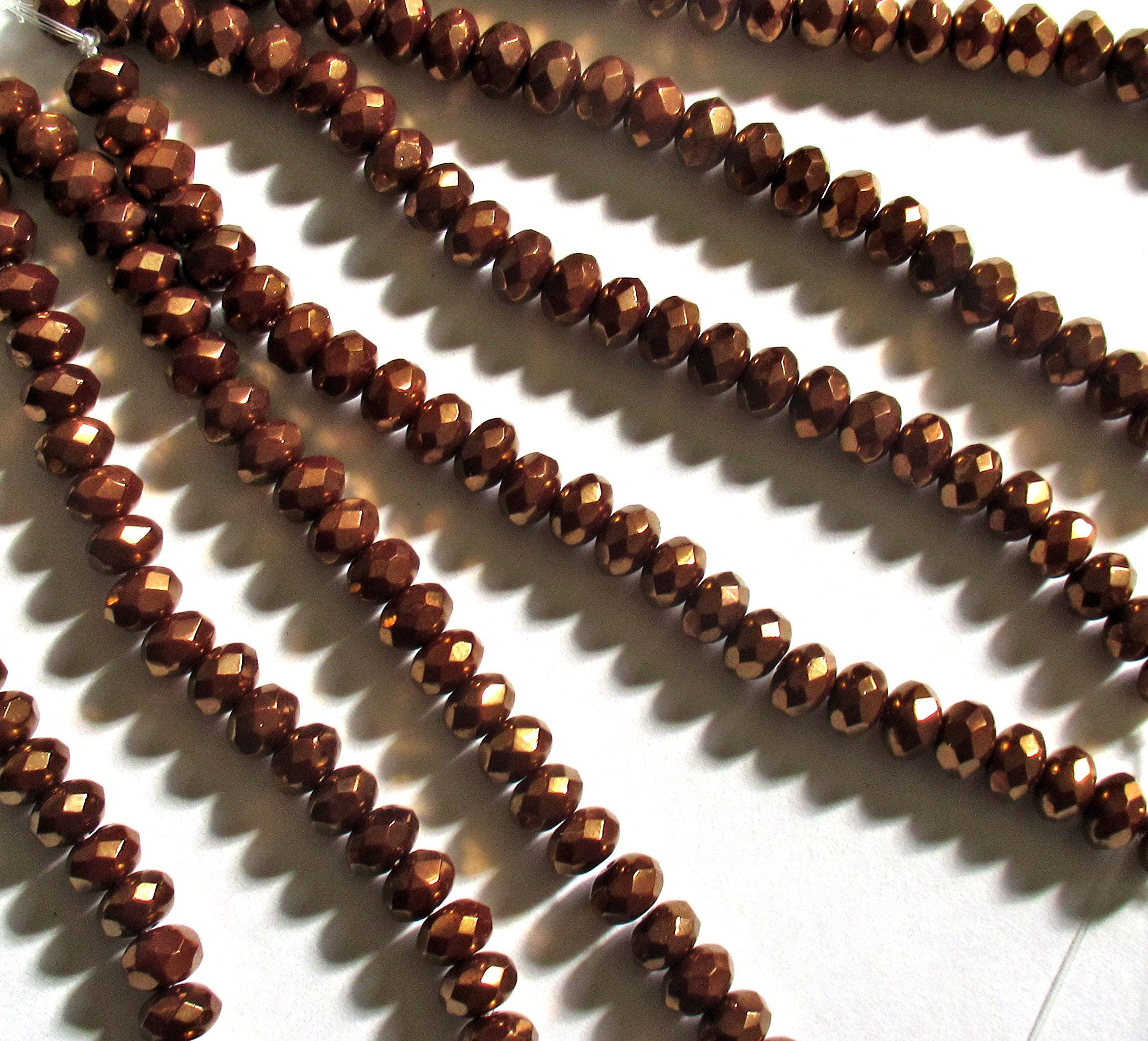 Lot of 25 Czech glass puffy rondelle beads - 5 x 7mm metallic bronze / brown faceted rondelles C0089